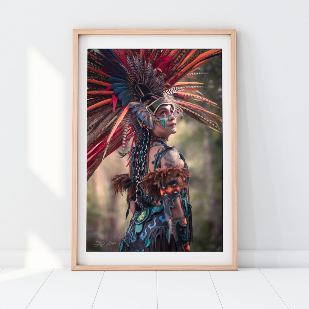 Coatlicue Aztec dancer photograph by JP Stones in a light wood frame